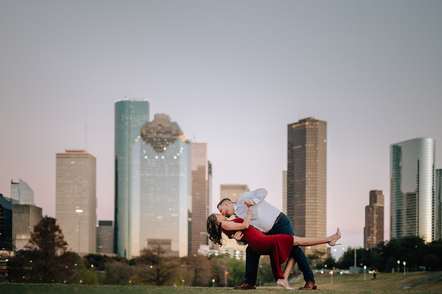 Houston Engagement photos in front of the houston skyline